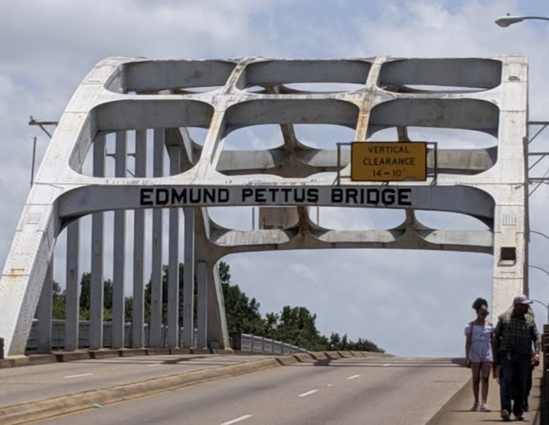 John Lewis, civil rights giant, crosses Selma bridge on way to