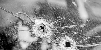 gun guns violence bullet holes