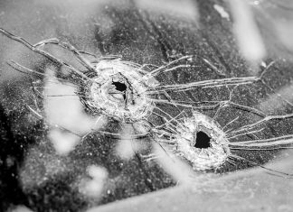 gun guns violence bullet holes