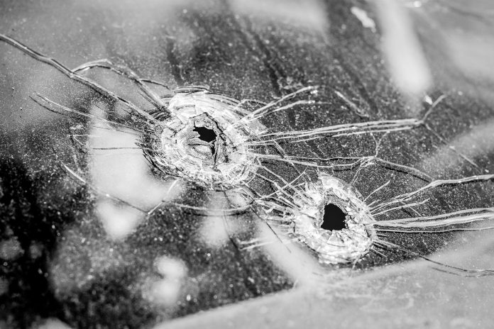 gun guns violence bullet holes