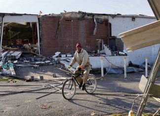 tornado aftermath survivors search devastation bicycle