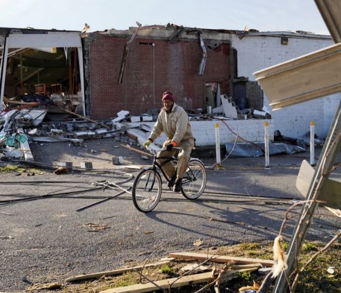 tornado aftermath survivors search devastation bicycle